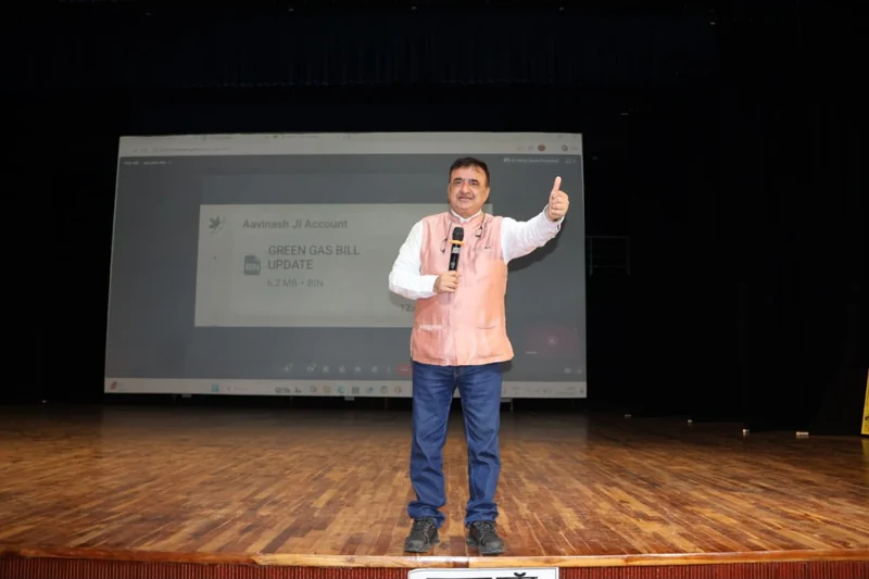 Rakshit Tandon speaking on stage during an awareness session