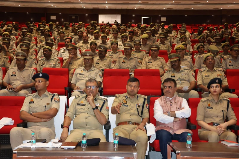 Police officers and attendees at a cyber awareness event