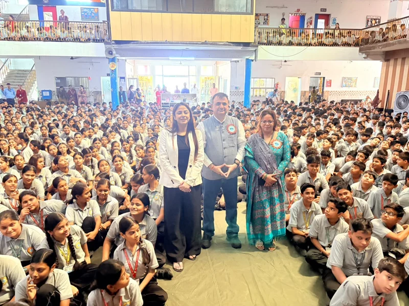 Rakshit Tandon with students and educators at a school awareness session